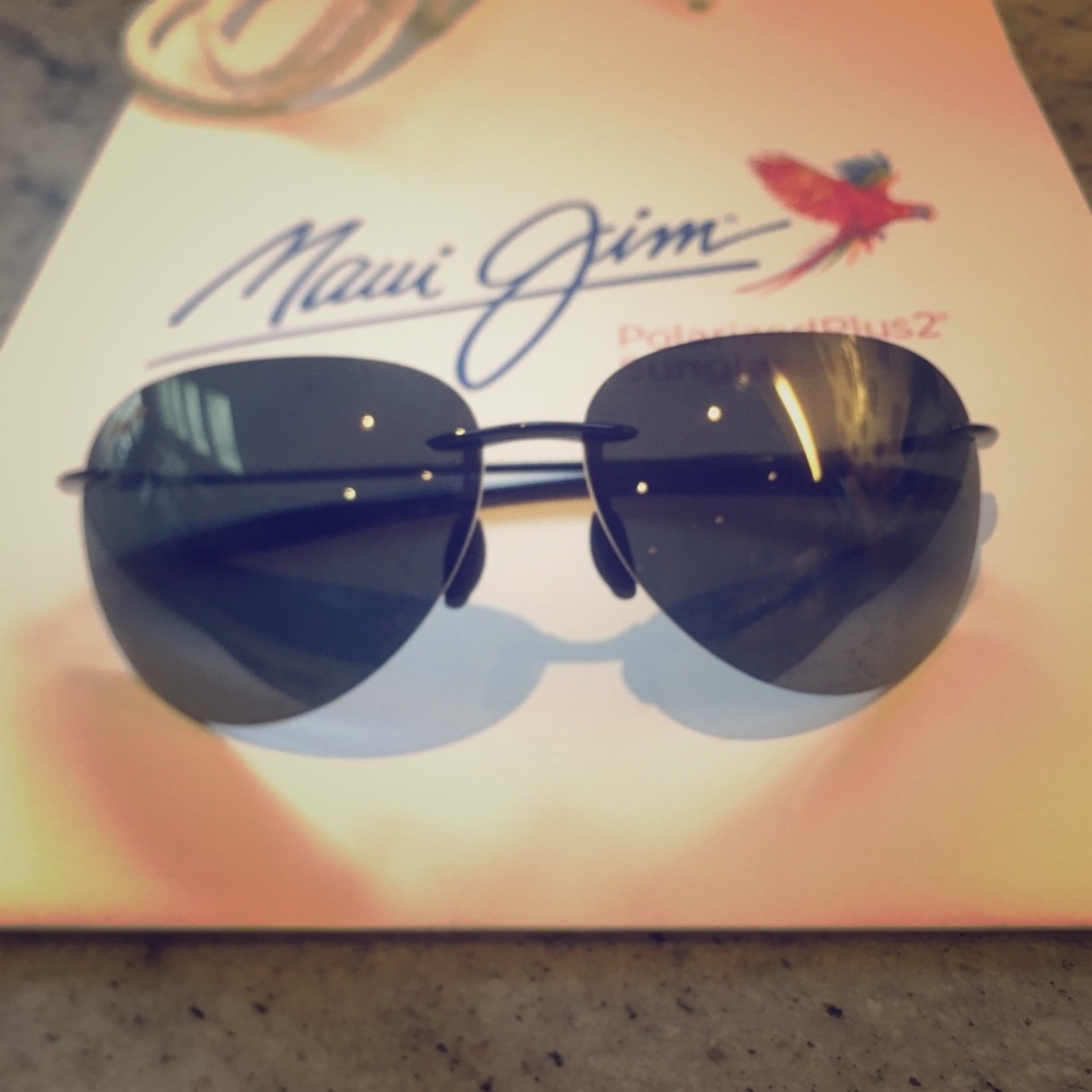 Brand new (never worn) co-ed Maui Jim sunglasses!